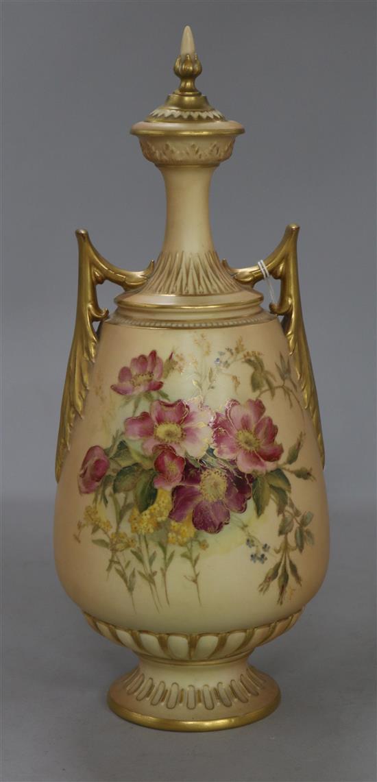 A Royal Worcester blush ivory two-handled vase and cover